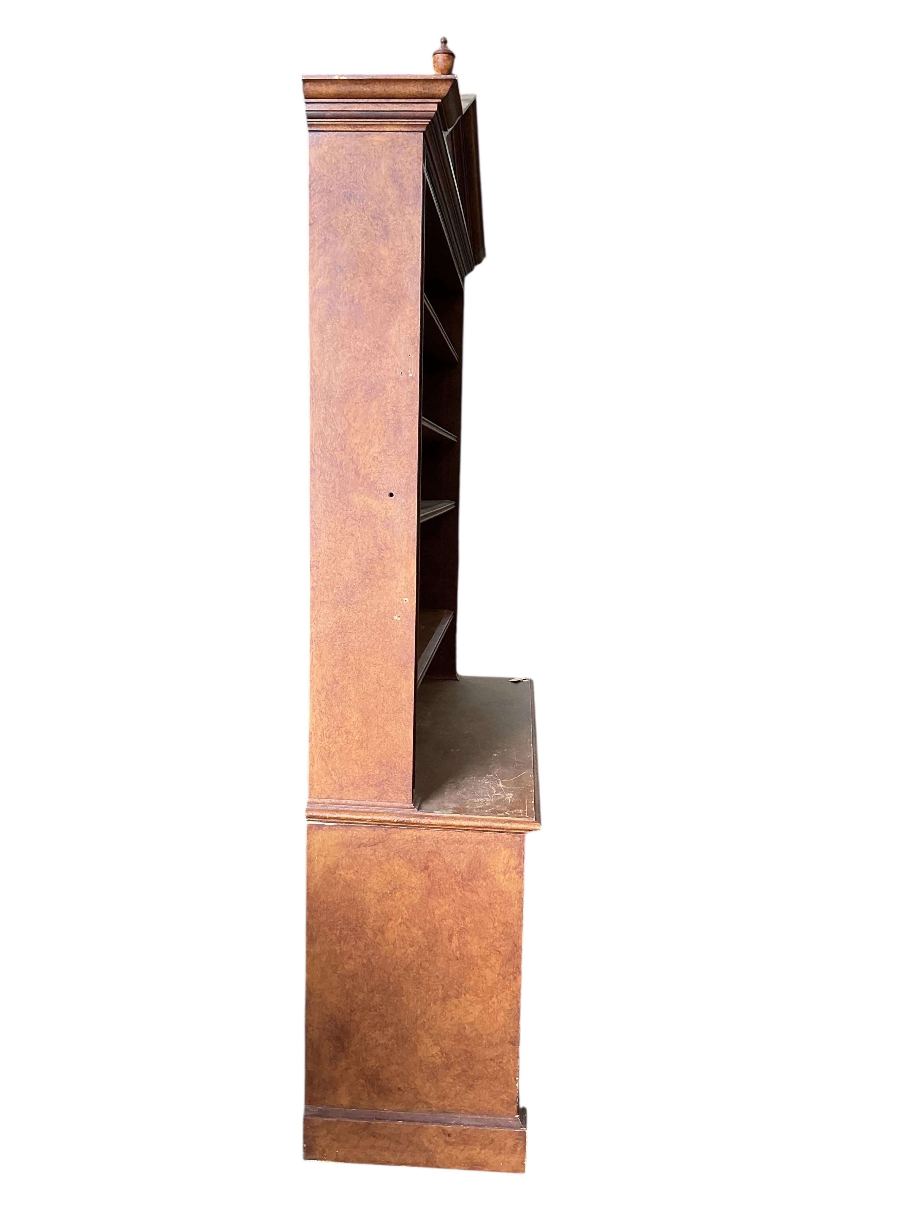 A reproduction George III style oak open library bookcase with painted simulated grain, width 144cm, depth 48cm, height 237cm